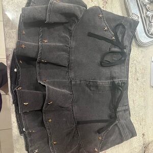 Stylish Black Mini Skirt with Star Accents